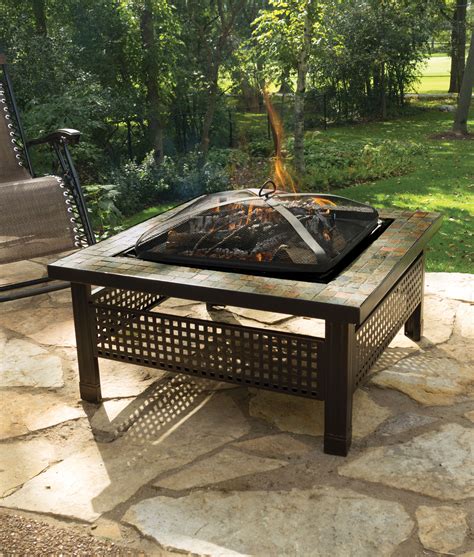 This Backyard Creations fire pit table utilizes liquid propane to provide a steady burn with a heat output of 50,000 BTU (LP tank sold separately). . Backyard creations fire pit